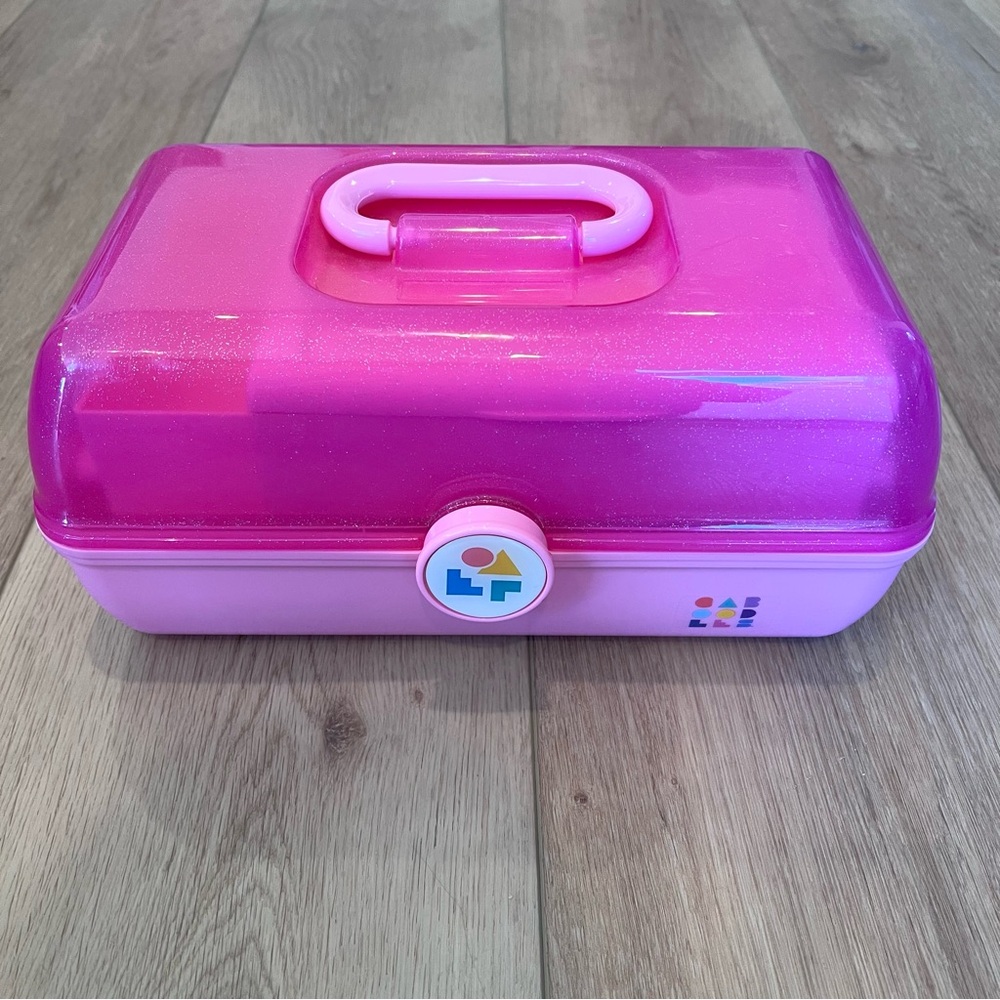 Glitter pink Caboodles makeup carrying case